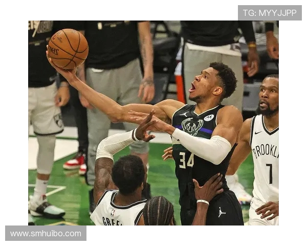 字母哥与麦基的对决谁能在赛场上笑到最后精彩对抗引发球迷热议